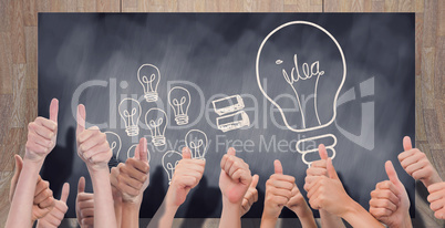 Composite image of group of hands giving thumbs up