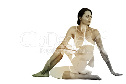 Composite image of fit woman doing the half spinal twist pose in
