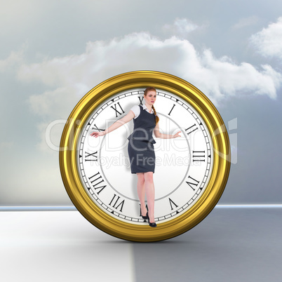 Composite image of businesswoman doing a balancing act