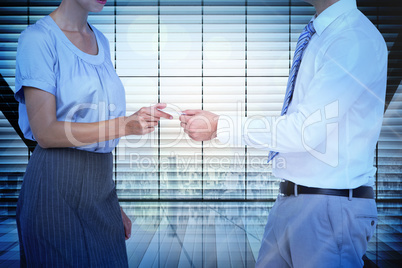 Composite image of business people exchanging business card