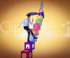 Composite image of smiling businessman with umbrella