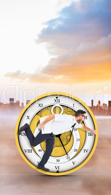 Composite image of geeky young businessman running late