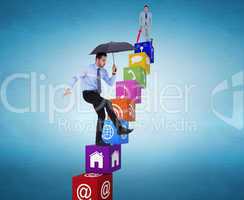 Composite image of smiling businessman with umbrella