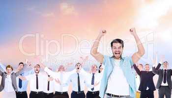 Composite image of happy casual man cheering at camera