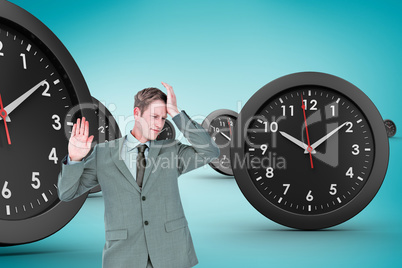 Composite image of stressed businessman getting a headache