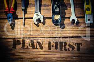 Plan first against desk with tools