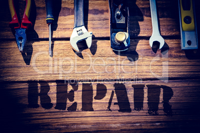 Repair against desk with tools