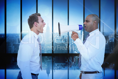 Composite image of businessman yelling with a megaphone at his c