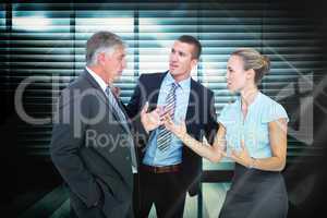 Composite image of business people having a disagreement