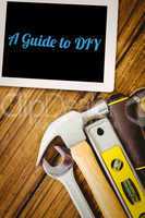 A guide to diy against desk with tools