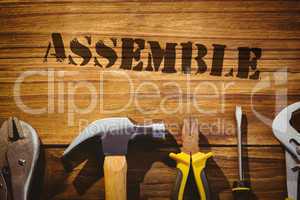 Assemble against desk with tools