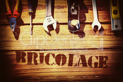 Bricolage against desk with tools