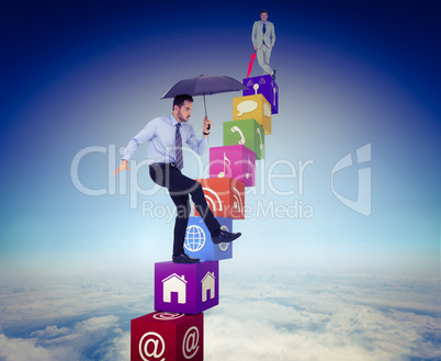 Composite image of smiling businessman with umbrella