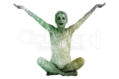 Composite image of toned young woman sitting with arms outstretc