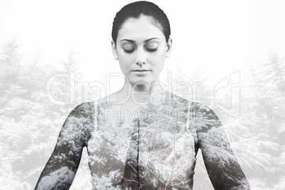 Composite image of peaceful woman in white sitting in lotus pose