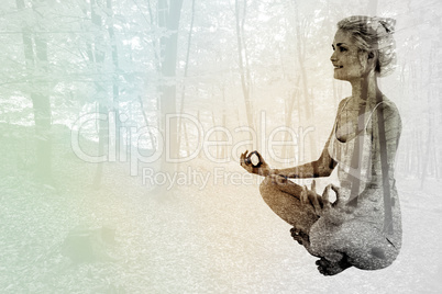 Composite image of full length of toned woman sitting in lotus p