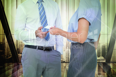 Composite image of business people exchanging business card