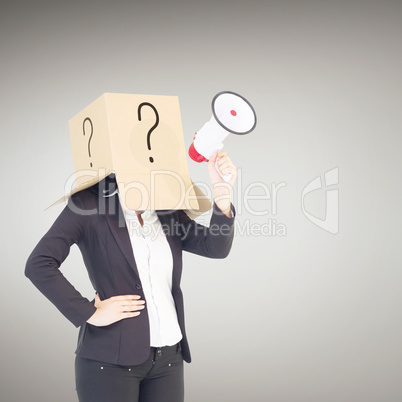 Composite image of anonymous businesswoman holding a megaphone