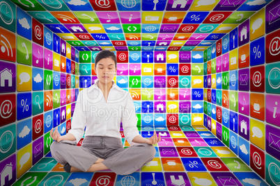 Composite image of businesswoman sitting in lotus pose Composite image of businesswoman sitting in lotus pose