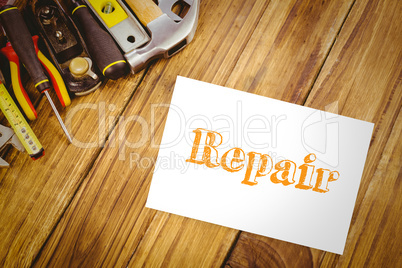 Repair against desk with tools