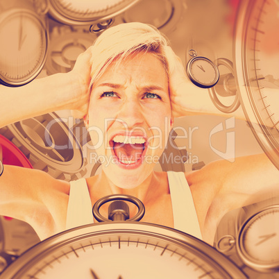 Composite image of angry blonde screaming and holding her head