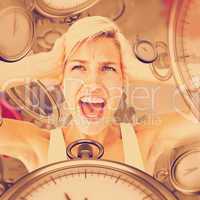 Composite image of angry blonde screaming and holding her head