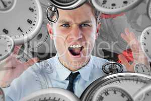 Composite image of angry businessman shouting