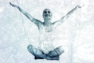 Composite image of toned young woman sitting with arms outstretc
