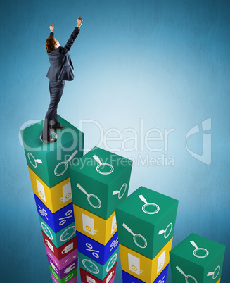 Composite image of businesswoman cheering