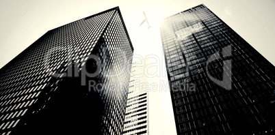 An airplane flying over buildings