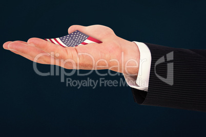 Composite image of businessman with wrist watch and hands out