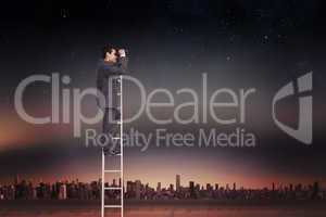 Composite image of businessman standing on ladder using binocula