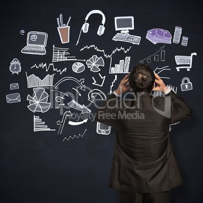 Composite image of stressed businessman with hands on head