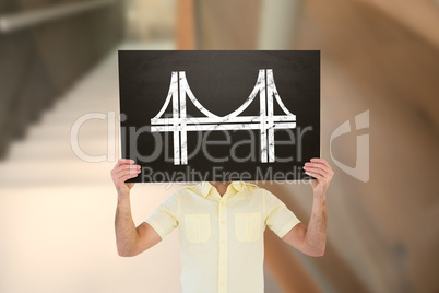 Composite image of casual man showing board