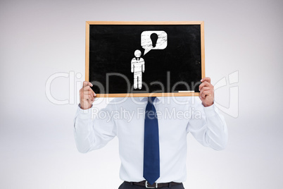 Composite image of businessman showing board