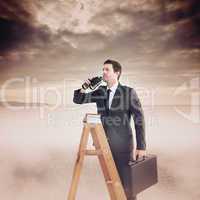 Composite image of businessman looking on a ladder