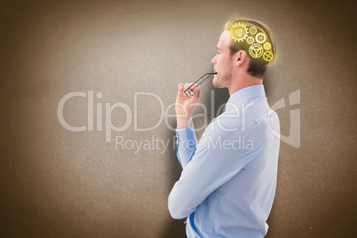 Composite image of businessman thinking