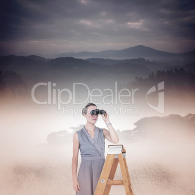 Composite image of businessman looking on a ladder