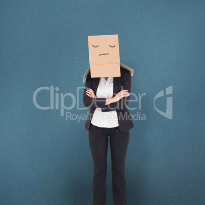 Composite image of businesswoman with box over head