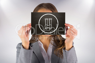 Composite image of businesswoman showing card