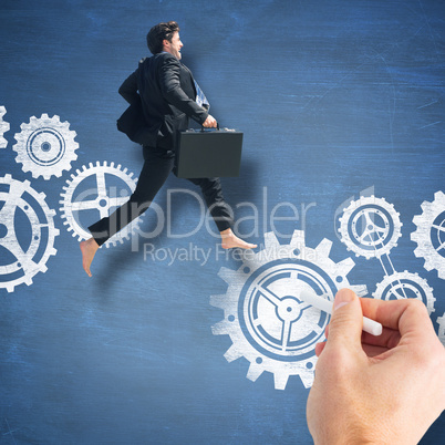 Composite image of businessman jumping