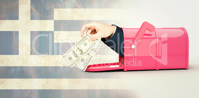 Composite image of hand holding hundred dollar bills