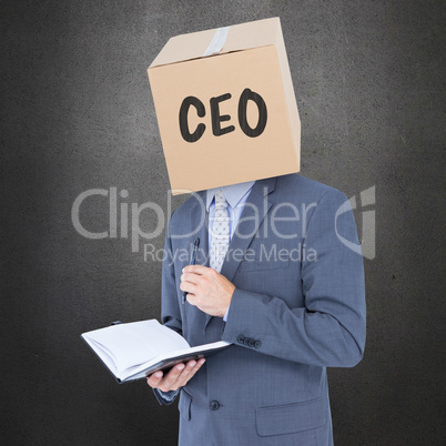 Composite image of anonymous businessman with diary