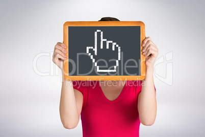 Composite image of woman covering face with chalkboard