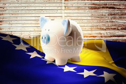 Composite image of piggy bank