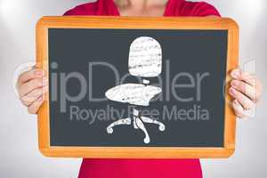 Composite image of woman showing chalkboard to camera