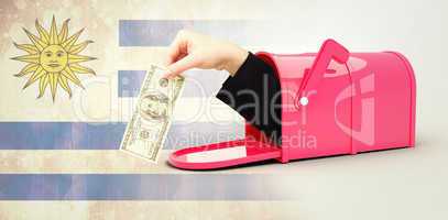 Composite image of businesswomans hand holding hundred dollar bi