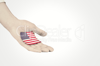 Composite image of businesswomans hand presenting