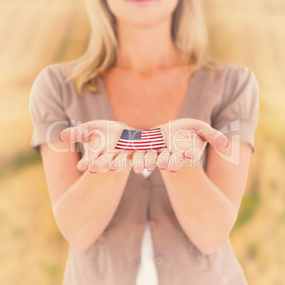 Composite image of happy blonde holding our her hands