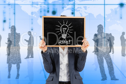 Composite image of businesswoman showing board